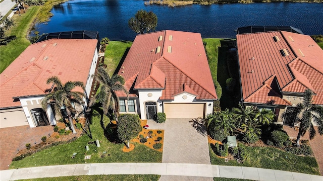 birds eye view of property featuring a water view