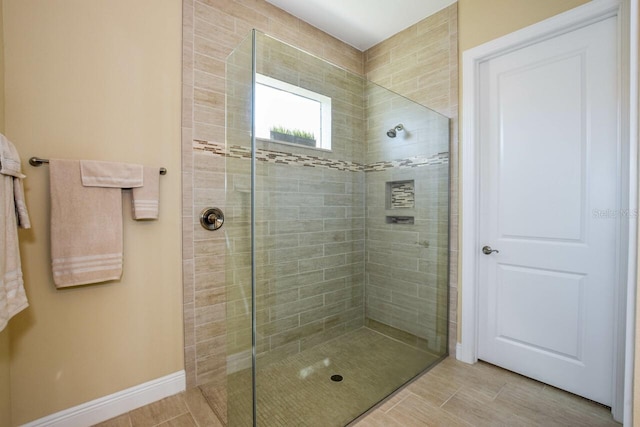 bathroom featuring tiled shower