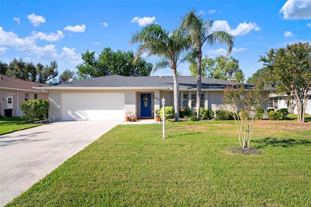 ranch-style house featuring a front yard and a garage