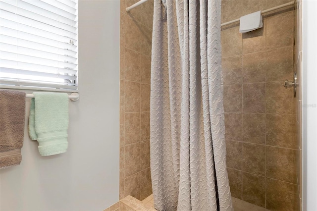 bathroom featuring walk in shower