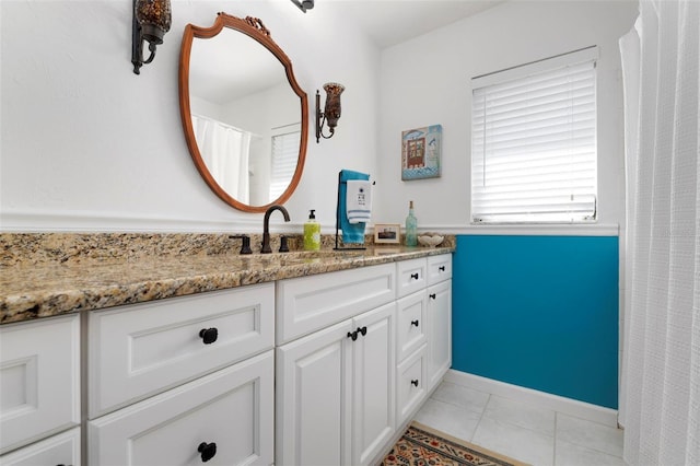 bathroom featuring vanity and tile patterned floors