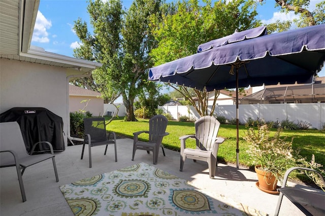 view of patio with a grill