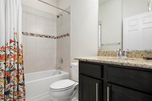 full bathroom featuring shower / bath combo, vanity, and toilet