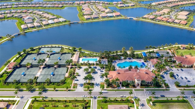 drone / aerial view with a water view