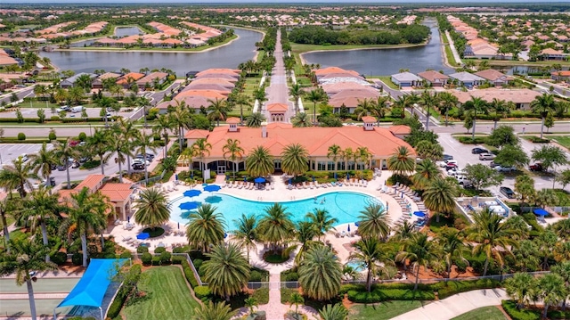 birds eye view of property featuring a water view