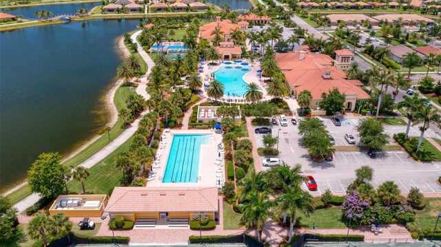 drone / aerial view featuring a water view