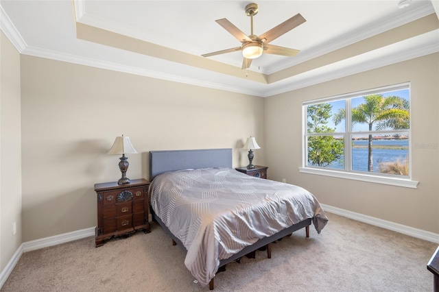 660 Ravello Blvd, Nokomis, FL 34275 - bedroom with a tray ceiling, crown molding, carpet floors, and baseboards