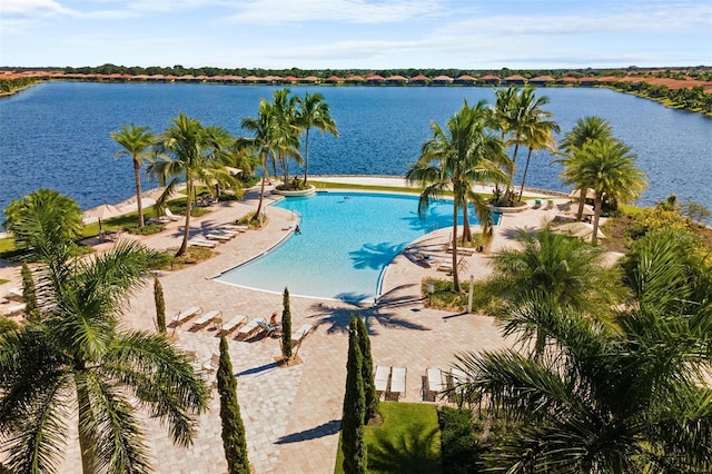 view of pool featuring a water view