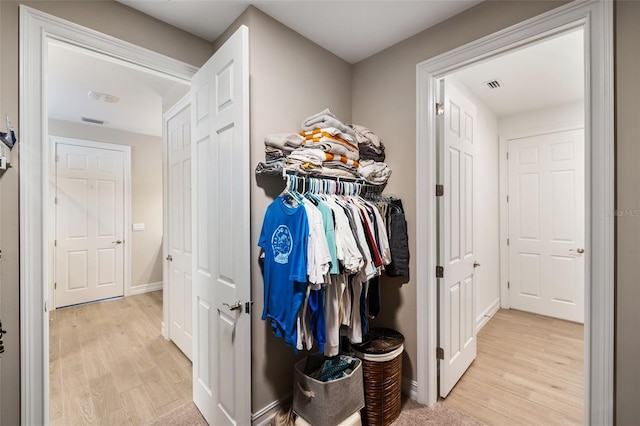 660 Ravello Blvd, Nokomis, FL 34275 - spacious closet with light wood finished floors