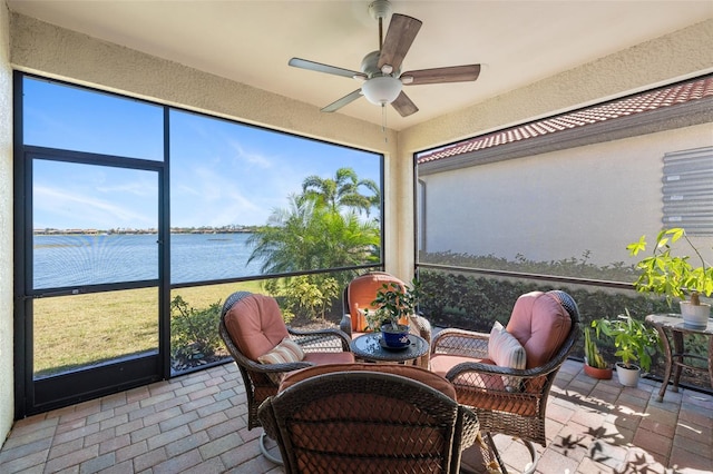 660 Ravello Blvd, Nokomis, FL 34275 - sunroom / solarium featuring a water view, a ceiling fan, and plenty of natural light