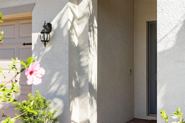 660 Ravello Blvd, Nokomis, FL 34275 - property entrance featuring stucco siding