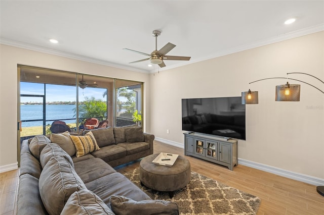 660 Ravello Blvd, Nokomis, FL 34275 - living area featuring baseboards, a ceiling fan, ornamental molding, light wood-type flooring, and recessed lighting