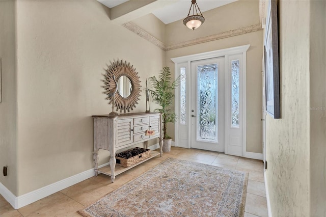 tiled foyer with beam ceiling