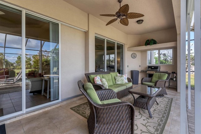 view of patio / terrace with ceiling fan and an outdoor hangout area