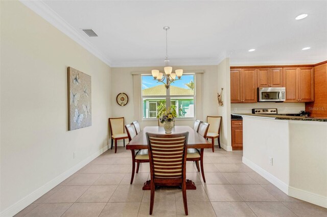 dining space featuring crown molding, light tile patterned floors, and a notable chandelier