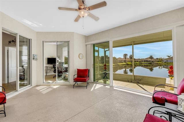 sunroom / solarium with ceiling fan