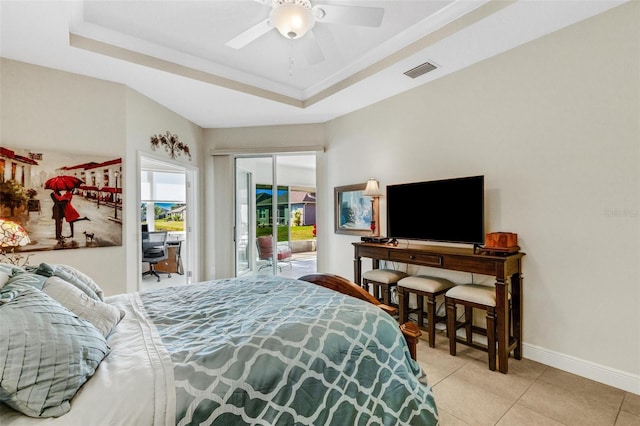 bedroom featuring light tile patterned floors, access to outside, a raised ceiling, and ceiling fan