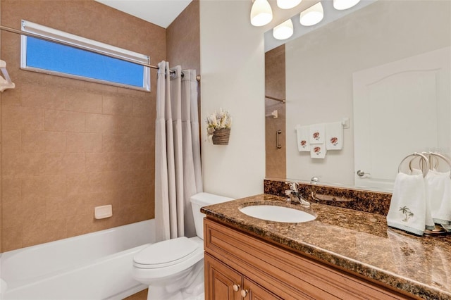 full bathroom featuring vanity, toilet, and shower / bath combo with shower curtain