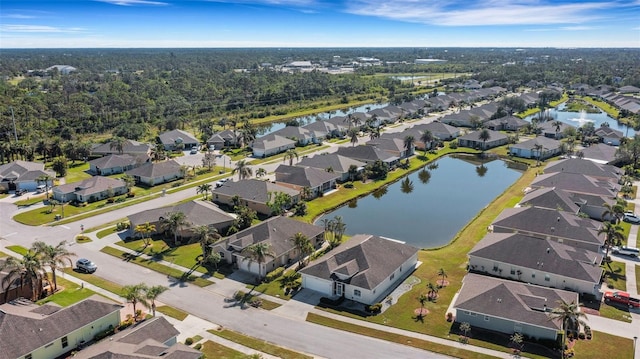 drone / aerial view with a water view