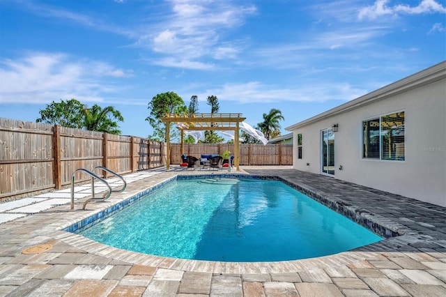 view of pool with a pergola and a patio