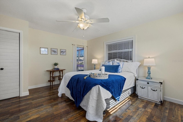 bedroom featuring ceiling fan and dark hardwood / wood-style flooring