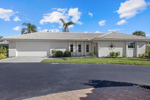 ranch-style house with a garage