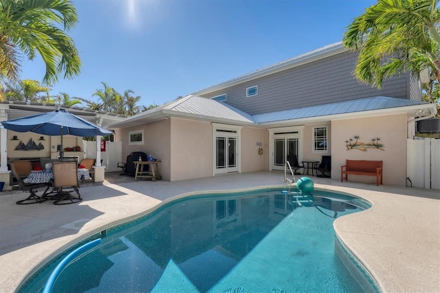 rear view of property with a patio