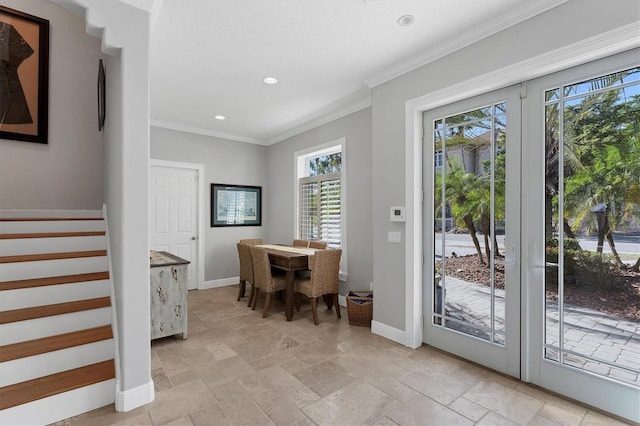 doorway to outside featuring ornamental molding and french doors