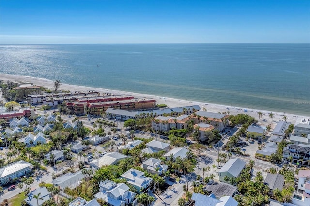 aerial view with a water view and a view of the beach