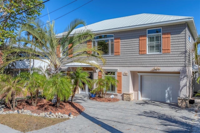 view of front of house with a garage