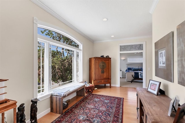 6405 Gulf Dr, Holmes Beach, FL 34217 - interior space with light wood-type flooring, baseboards, and ornamental molding