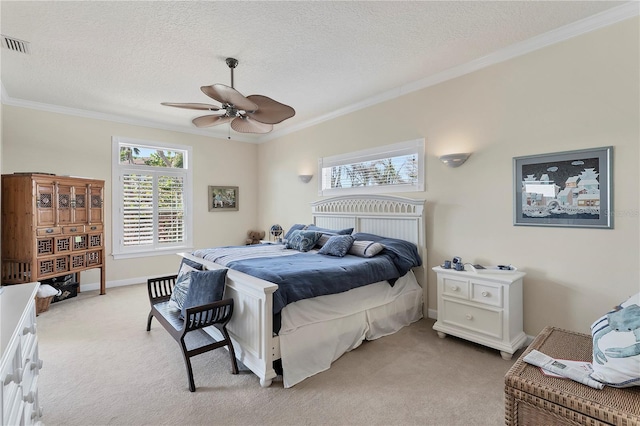 6405 Gulf Dr, Holmes Beach, FL 34217 - bedroom with baseboards, ornamental molding, a textured ceiling, visible vents, and light colored carpet