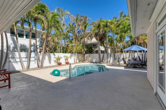 6405 Gulf Dr, Holmes Beach, FL 34217 - view of swimming pool with a fenced backyard, a fenced in pool, and a patio
