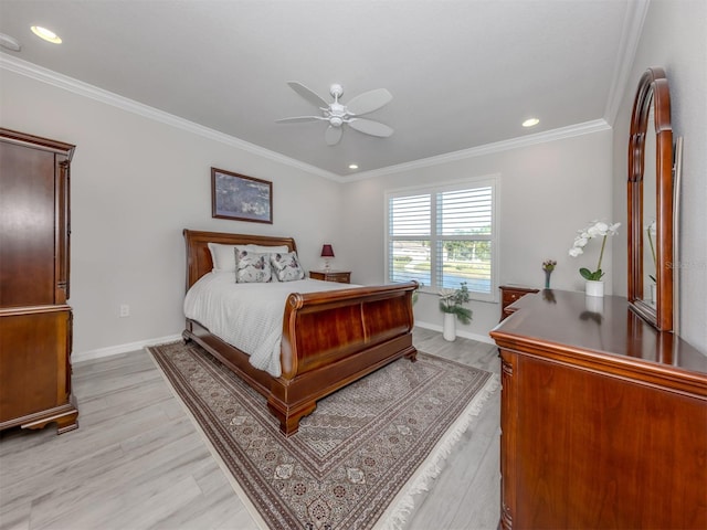 bedroom featuring ceiling fan, crown molding, and light wood-type flooring