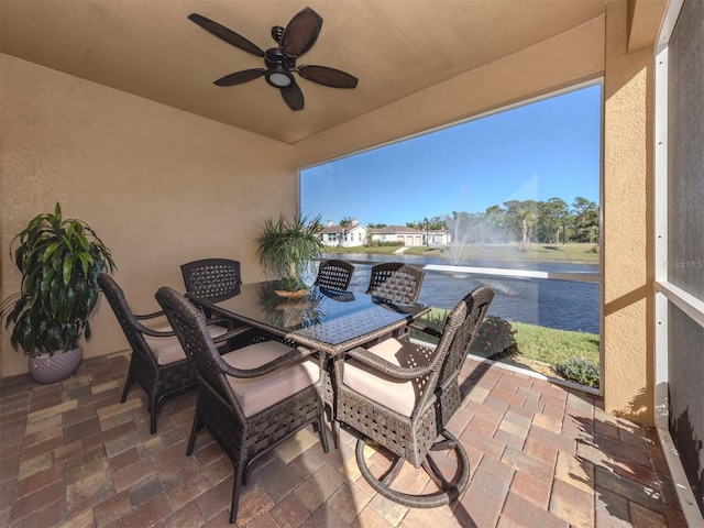 view of patio featuring ceiling fan