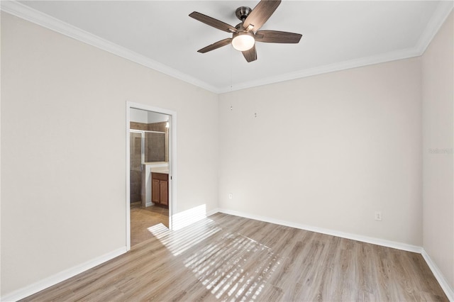 spare room with ceiling fan, light hardwood / wood-style flooring, and ornamental molding