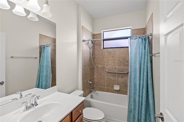 full bathroom featuring vanity, toilet, and shower / bath combo with shower curtain