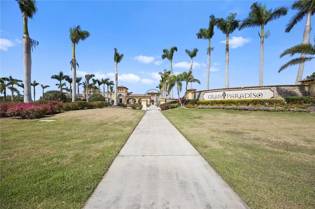 view of home's community with a lawn