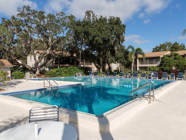 view of pool featuring a patio