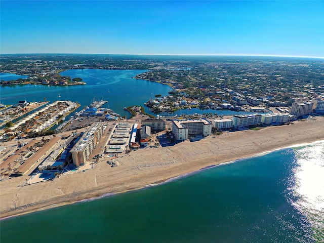 aerial view featuring a water view and a beach view