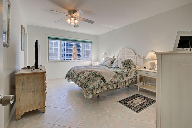 bedroom featuring ceiling fan and light tile patterned flooring