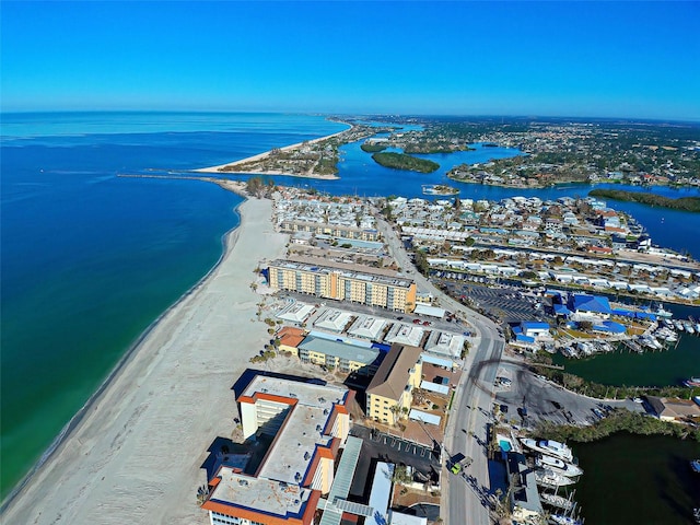 aerial view with a water view and a view of the beach