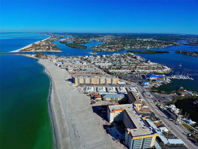 aerial view with a water view and a view of the beach