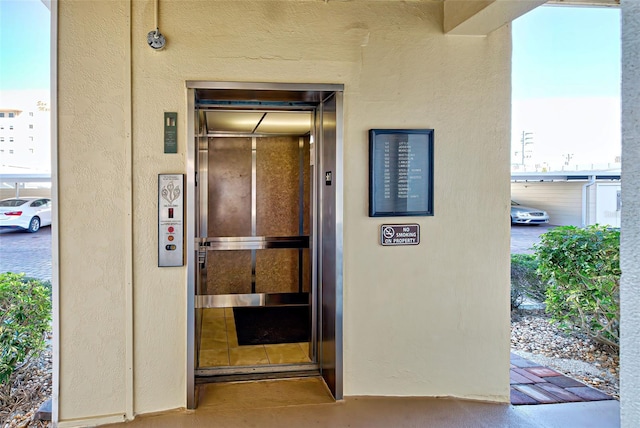 view of exterior entry featuring elevator