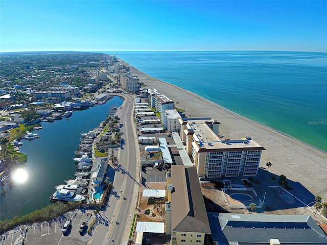 aerial view featuring a view of the beach and a water view