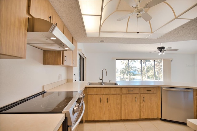 kitchen with ceiling fan, dishwasher, sink, stove, and a textured ceiling