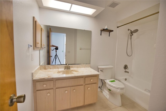 full bathroom with tile patterned floors, vanity, toilet, and shower / bath combination