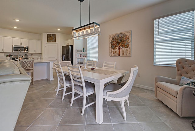 dining room featuring light tile patterned flooring