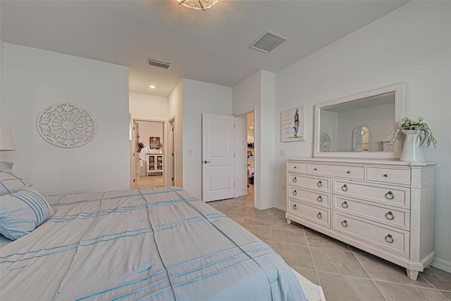 bedroom featuring light tile patterned floors