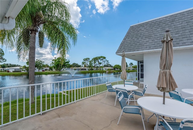 view of patio / terrace with a water view